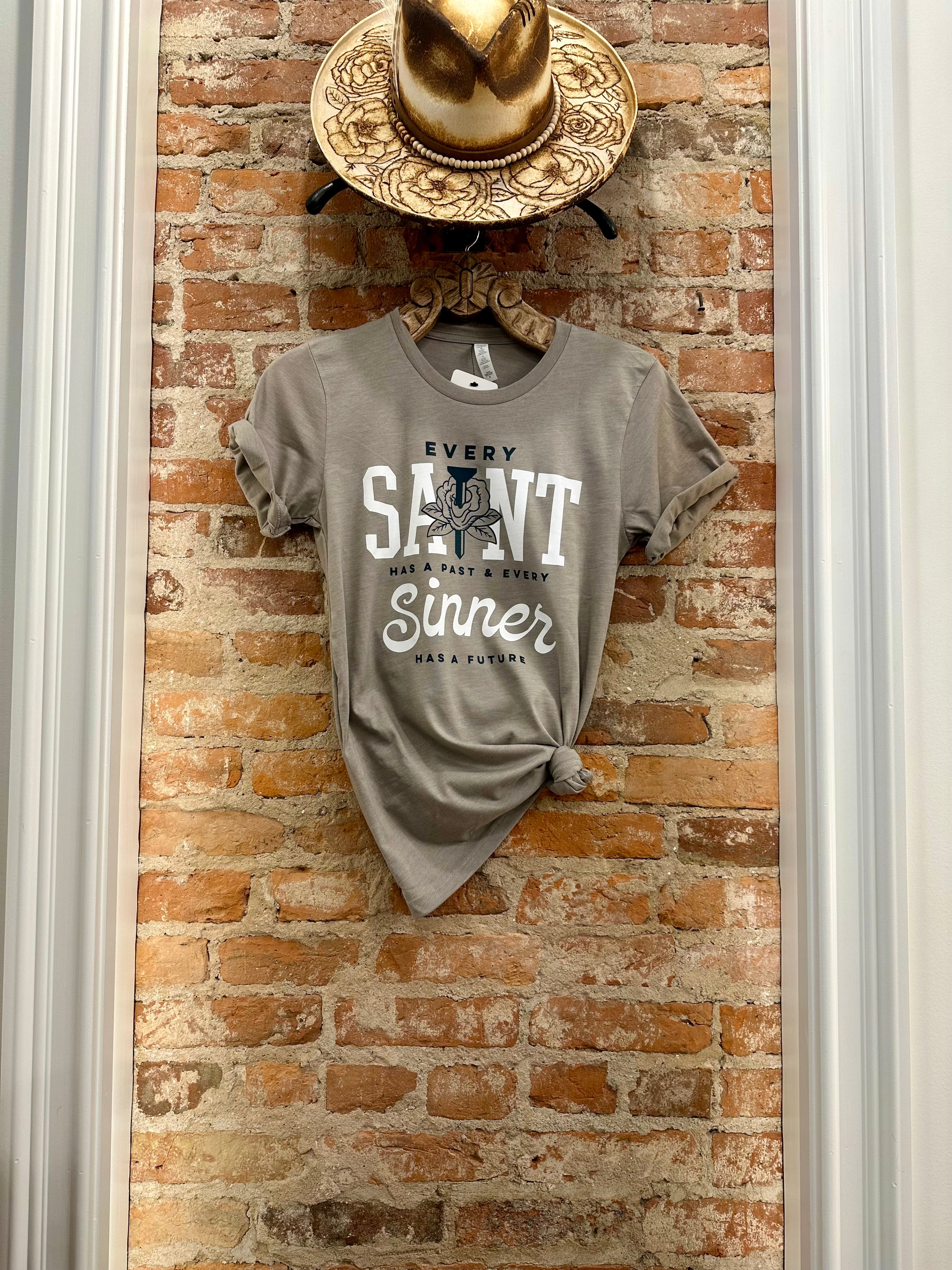 Every Saint Has a Past Tee by Ruby’s Rubbish®