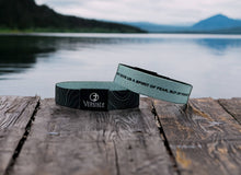 Load image into Gallery viewer, Black Topography / 2 Timothy 1:7 Wristband
